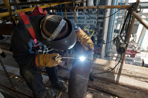 istock Welding works at installation of new pipeline 946812200