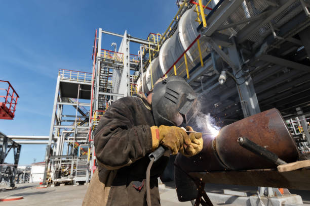 istock Welding works at installation of new pipeline 946815942