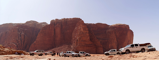 Wadi Rum, Jordan, March 8.2018: Exploring the reserve of Wadi Rum by SUV, groups of tourists in the desert