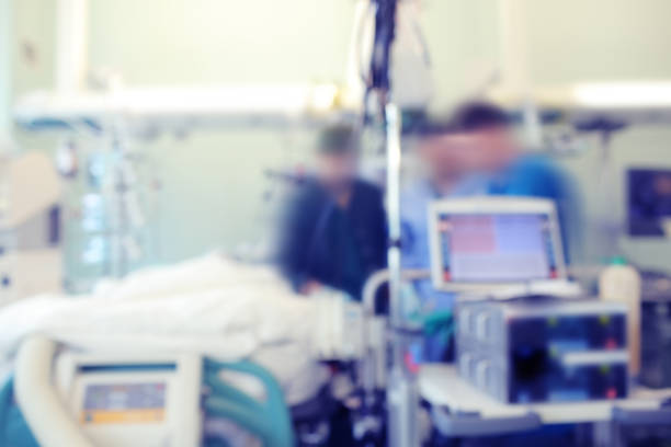 istock Doctor's round in the intensive care unit, unfocused background 946828248