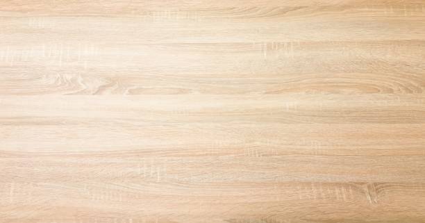 istock wood texture background, light oak wooden planks pattern table top view. 946828994