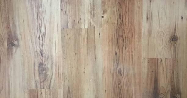 istock Light soft wood floor surface texture as background, varnished wooden parquet. Old grunge washed oak laminate pattern top view. 946831222