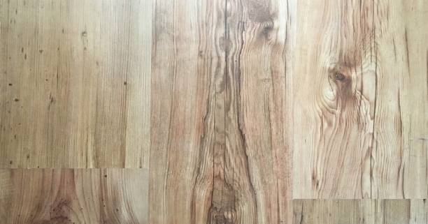 istock Light soft wood floor surface texture as background, varnished wooden parquet. Old grunge washed oak laminate pattern top view. 946831262