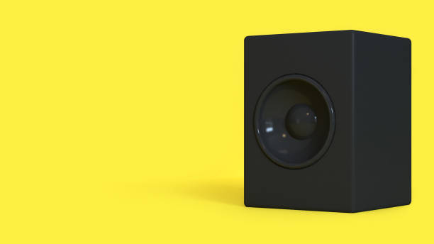 istock 3d rendering abstract black loudspeaker minimal yellow background 946831522