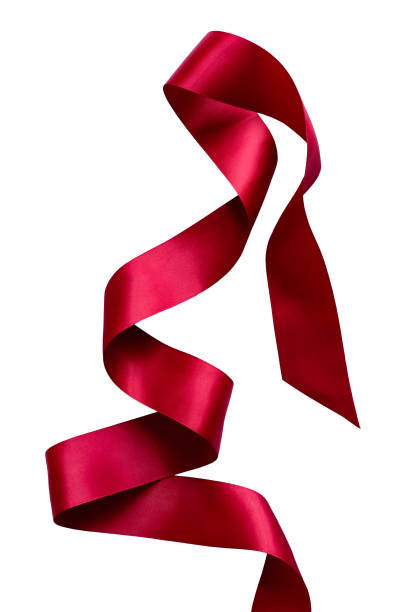 istock Shiny decorative red satin ribbon on white background, isolated. Scarlet tape, design element. 946834774