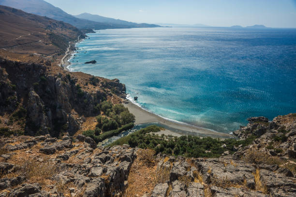 istock River flowing into sea at Preveli beach 946834878