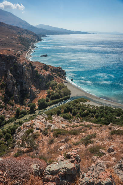 istock River flowing into sea at Preveli beach 946835006