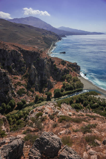 istock River flowing into sea at Preveli beach 946835044