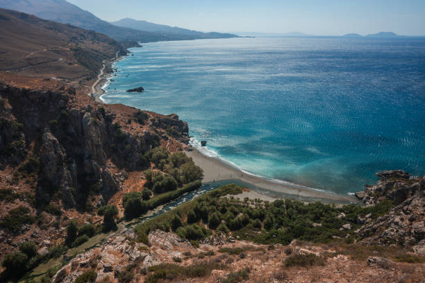 istock River flowing into sea at Preveli beach 946835096