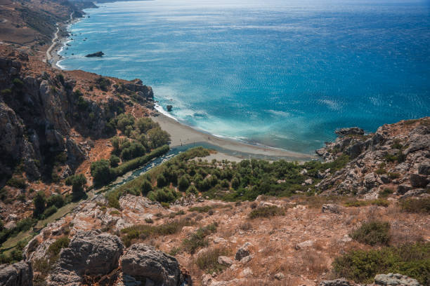 istock River flowing into sea at Preveli beach 946835150