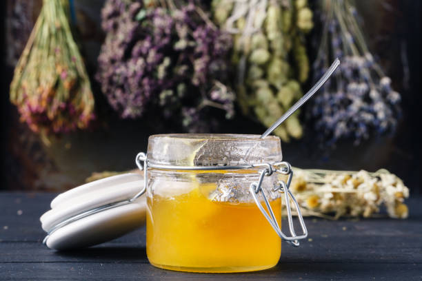 istock folk medicine with honey and healing herbs concept 946837828