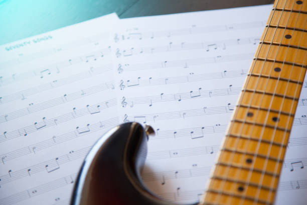 istock Music, guitar and music sheets 946838496