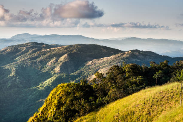 istock mountain ridge and sunset golden light with clouds 946845664