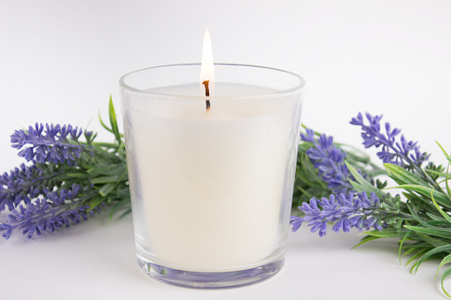 Candle in glass on white background with lavender, product mock-up.