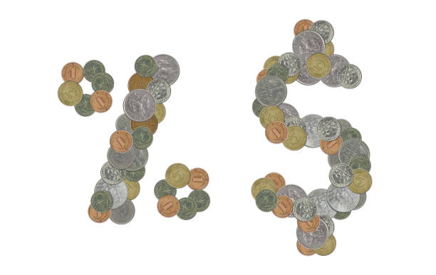 istock Percent next to the Dollar  symbol with mixed  coins on white background 946854296