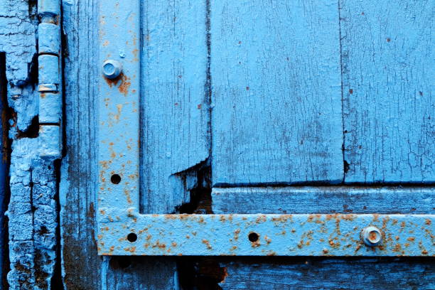 istock Close up Old Blue Wood Door Background. 946856718