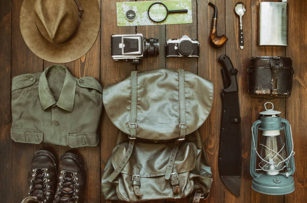 istock Hiking stuff arranged on wooden floor 946856914