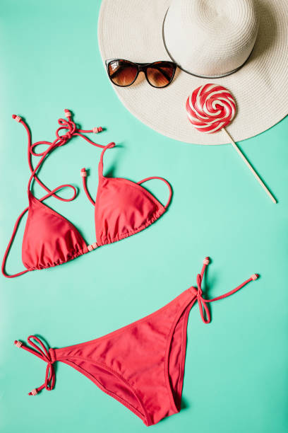 istock Summer vacation concept with pink bikini suit, hat and accessories 946856952
