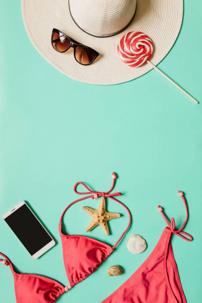 istock Summer vacation concept with pink bikini suit, hat and accessories 946856956