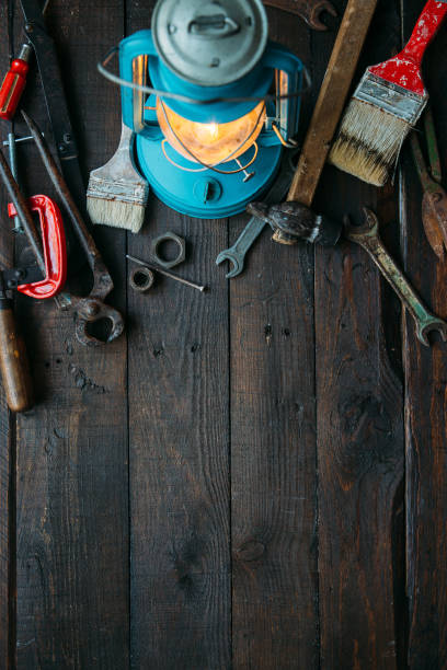 istock Vintage tools set on dark brown wooden background 946856978