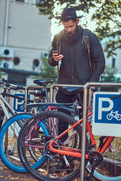 istock A handsome hipster traveler with a stylish beard and tattoo on h 946857902