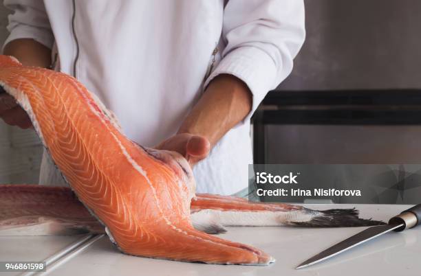 Chefs Hand Holding Fresh Piece Of Salmon Stock Photo - Download Image Now - Fish, Salmon - Seafood, Chef