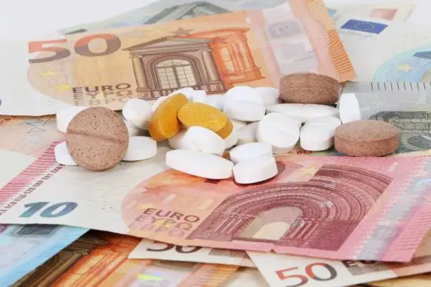 Photo of different euros with medicine