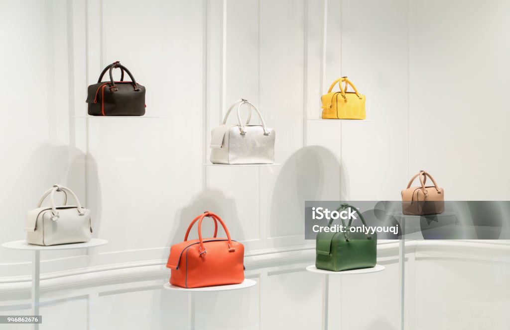 Fashion Handbags In A Shop Window Stock Photo - Download Image Now -  Luxury, Bag, Purse - iStock