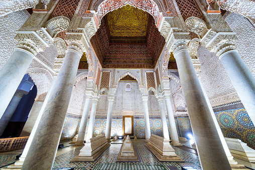 Marrakech, Morocco - December 30, 2017: The room with the twelve columns in Saadian Tombs. These tombs are sepulchres of Saadi Dynasty members and are a major attraction for visitors in Marrakech