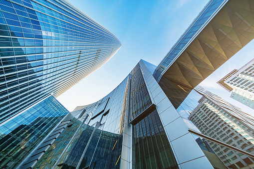 Modern Futuristic Architecture, Skyscrapers in downtown Seoul from below against blue summer sky. Sincheon-dong, Songpa-Gu, Greater Gangnam District, Seoul, South Korea, Asia.