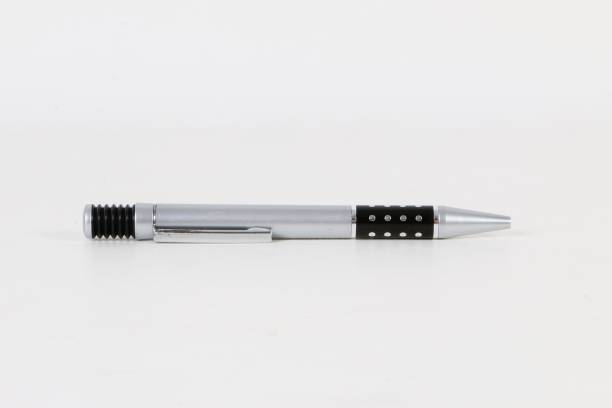 istock silver ball pen is lying in the studio 946869318