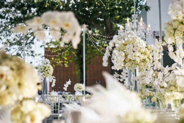 istock White roses, flower, floral decoration on thewedding reception dinner table 946870538