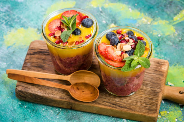 istock Healthy fresh fruits breakfast in jars 946872796
