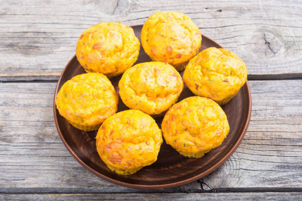 istock Homemade baked muffins with cheese 946874164