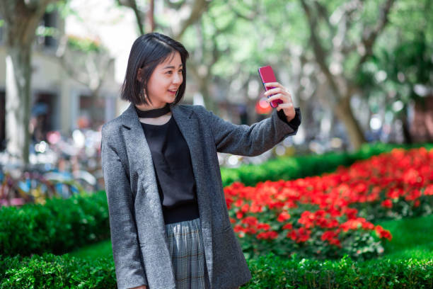 istock Shy Girl Making Selfie 946877798