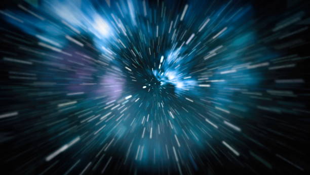 istock Abstract of warp or hyperspace motion in blue star trail. 946880518