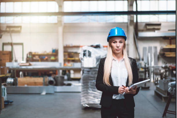 istock Lady boss in a factory 946882094