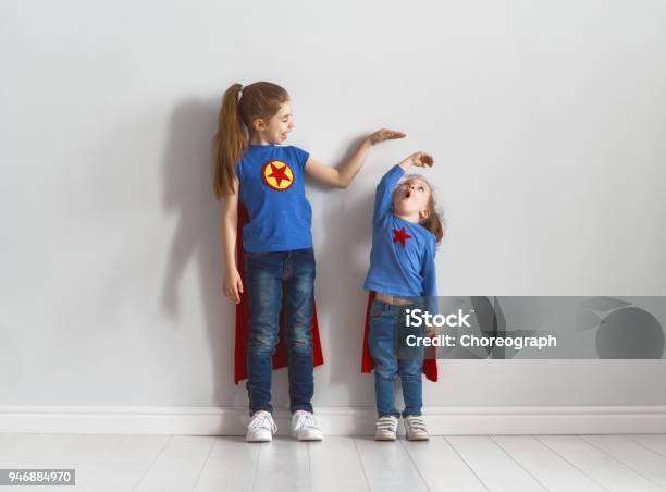 Children Are Playing Superhero Stock Photo - Download Image Now - Short - Length, Tall - High, Instrument of Measurement