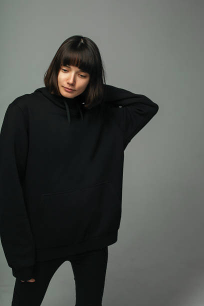 istock woman in total black outfit, posing 946894296