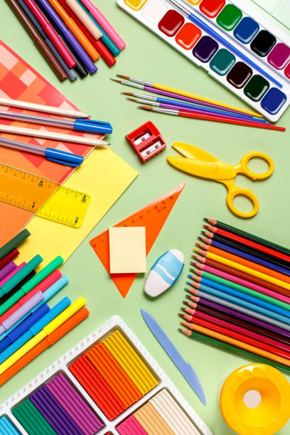 istock Back to school concept. School supplies on a pastel background 946898370