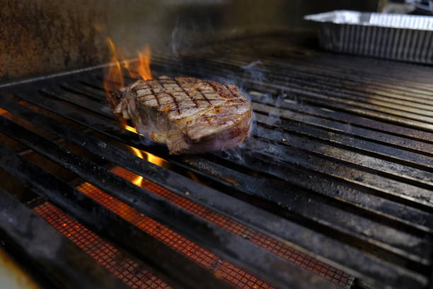 istock Ribeye steaks on the grill 946898868