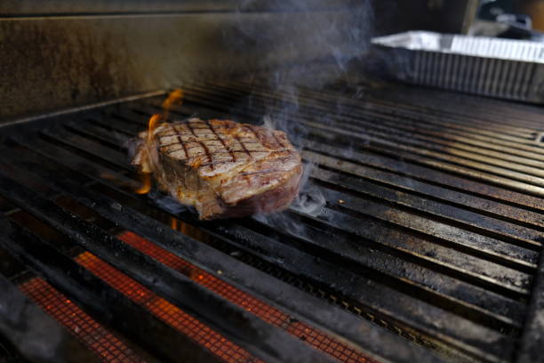 istock Ribeye steaks on the grill 946898870