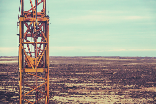 Retro Filtered Image Of Heavy Machinery At A Texas Oil Field With Copy Space