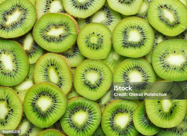 Sliced Kiwi As Textured Background Stock Photo - Download Image Now - Kiwi Fruit, Fruit, Green Color