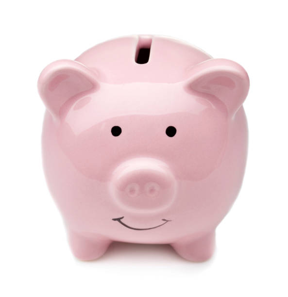 istock pink piggy bank isolated on white 946905392