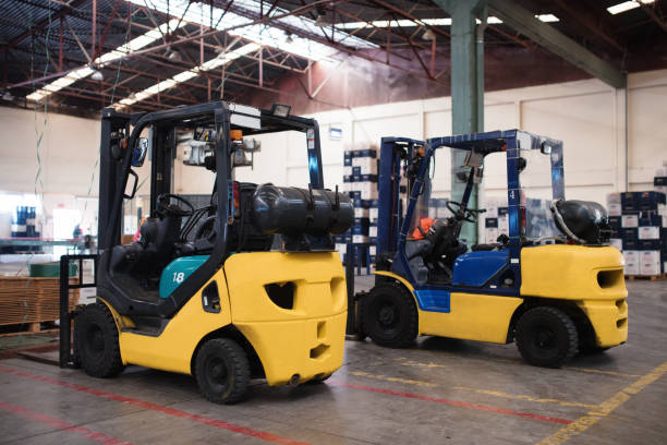 istock The forklift is in a large and light warehouse. Yellow color 946908866