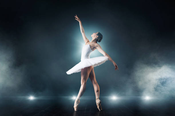 istock Ballet dancer dancing on the stage in theatre 946909766