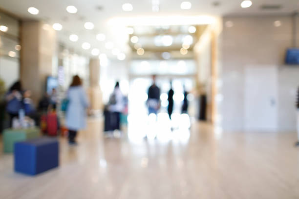 istock blurry lobby in hotel for background 946913846