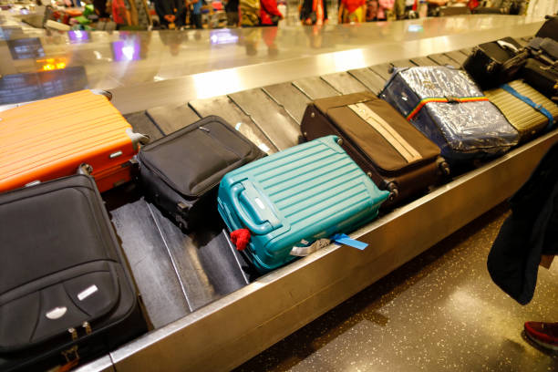 istock baggage claim at an airport 946913908