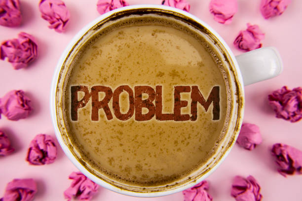 istock Writing note showing  Problem. Business photo showcasing Trouble that need to be solved Difficult Situation Complication written on Coffee in White Cup within Paper Balls on plain background. 946923368